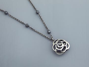 nicola bannerman Oxidised silver Bloom pendant with hematite bead chain